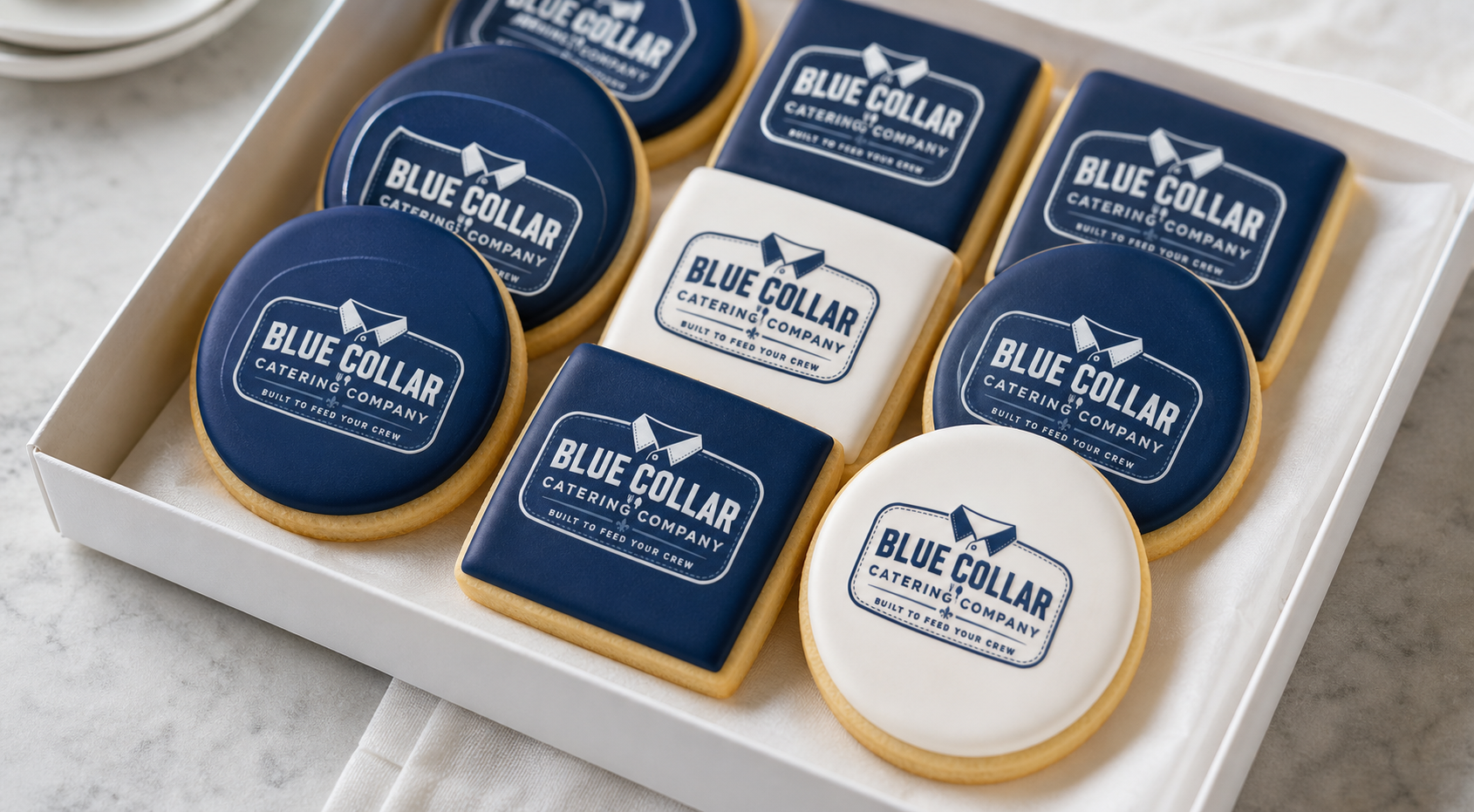 Custom-printed Blue Collar logo sugar cookies