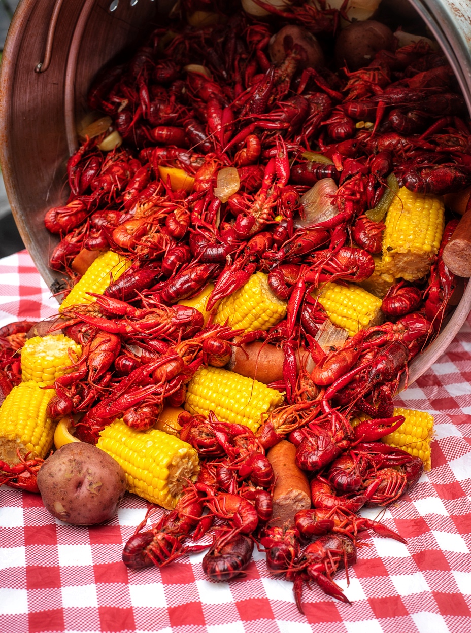 Traditional Louisiana crawfish boil with corn, potatoes, and sausage