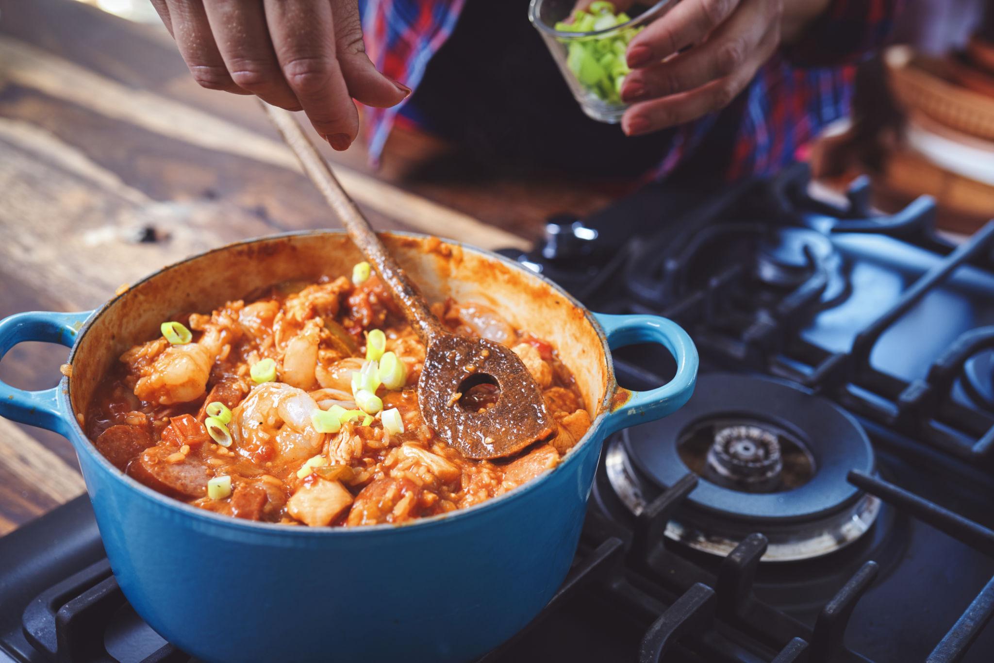 Louisiana-style rice and sausage dish being prepared